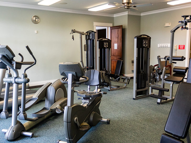 Full-appointed fitness center including a sauna, showers, and locker access.